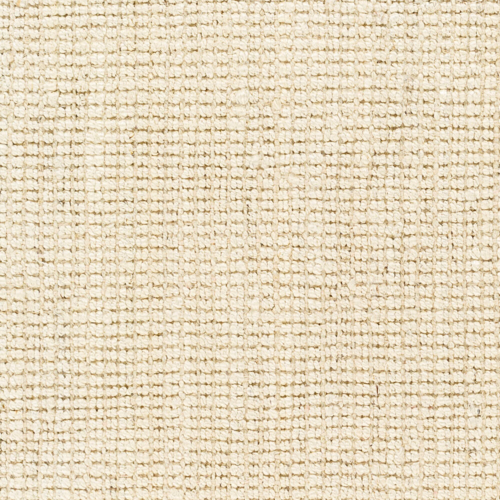 Close-up of butter jute rug texture, highlighting durable and natural weave.