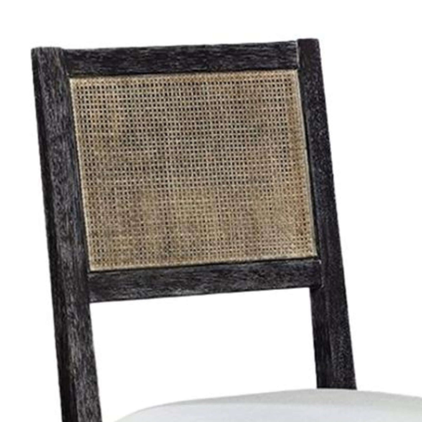 Close-up of the cane insert on the back of Caine I black dining chair.