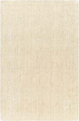Natural jute rug in butter hue with a handwoven texture.