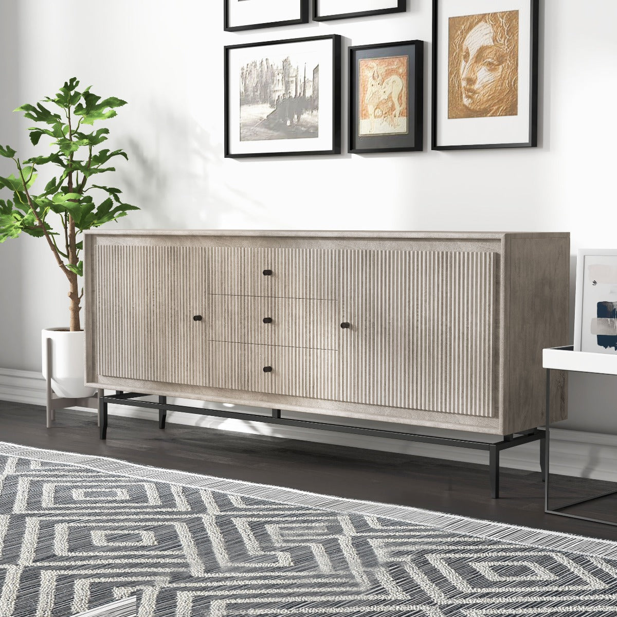 Camilo Dining Sideboard in a bright modern interior with geometric-pattern rug and stylish decorations.