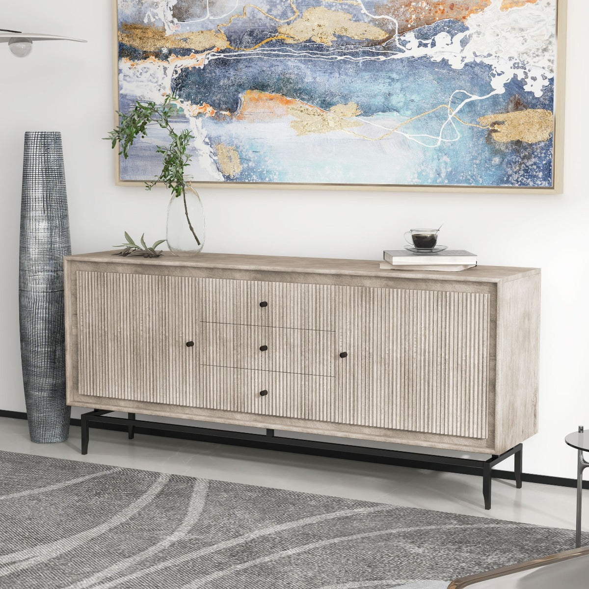 Dining Sideboard with three drawers and two cabinets, complemented by modern wall art and décor.