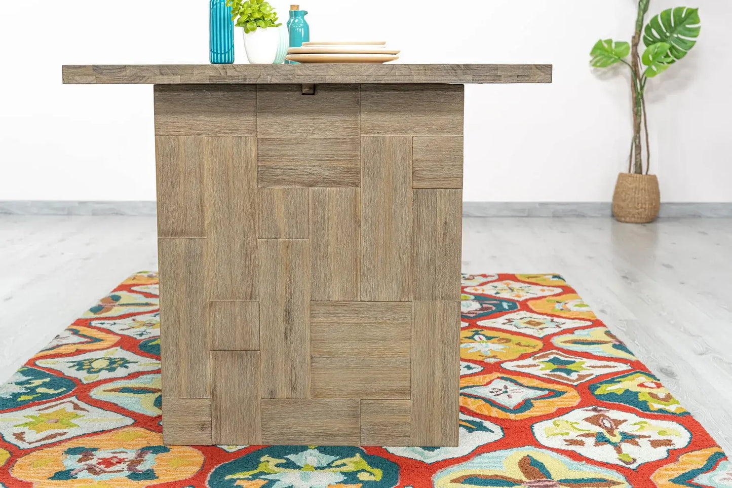 Close-up of Atlantis extension dining table's sturdy wooden legs and brushed wood finish.