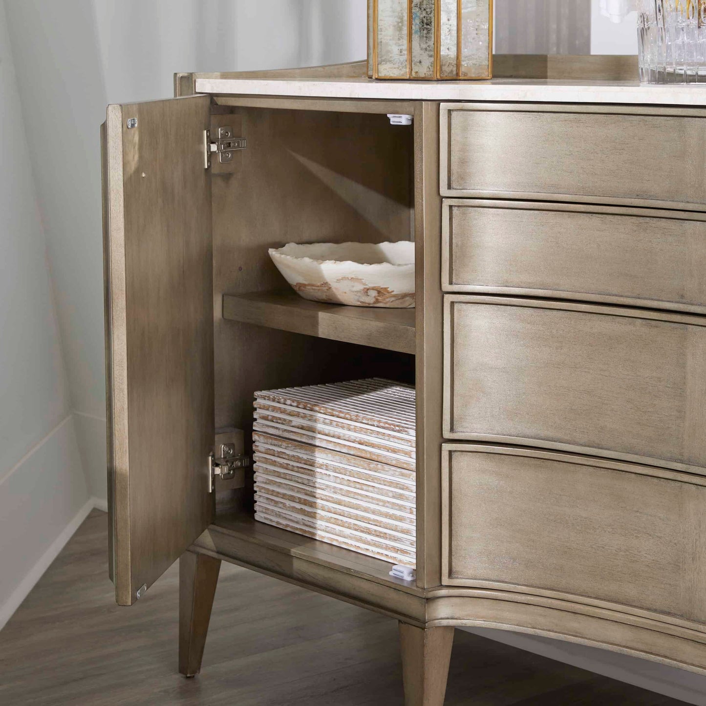 Open storage compartment of Cove Credenza with adjustable shelves