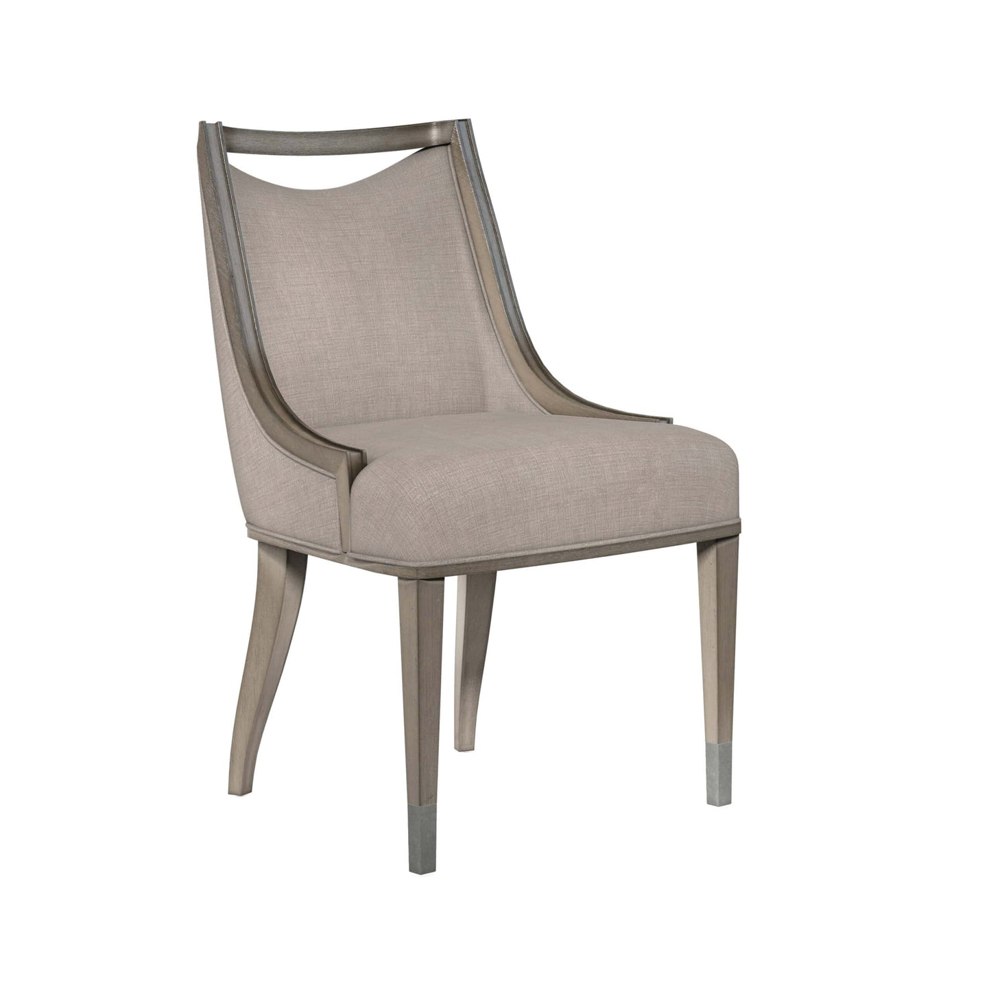  Angled view of the Cove transitional dining room chair, highlighting its sophisticated curves and elegant design.