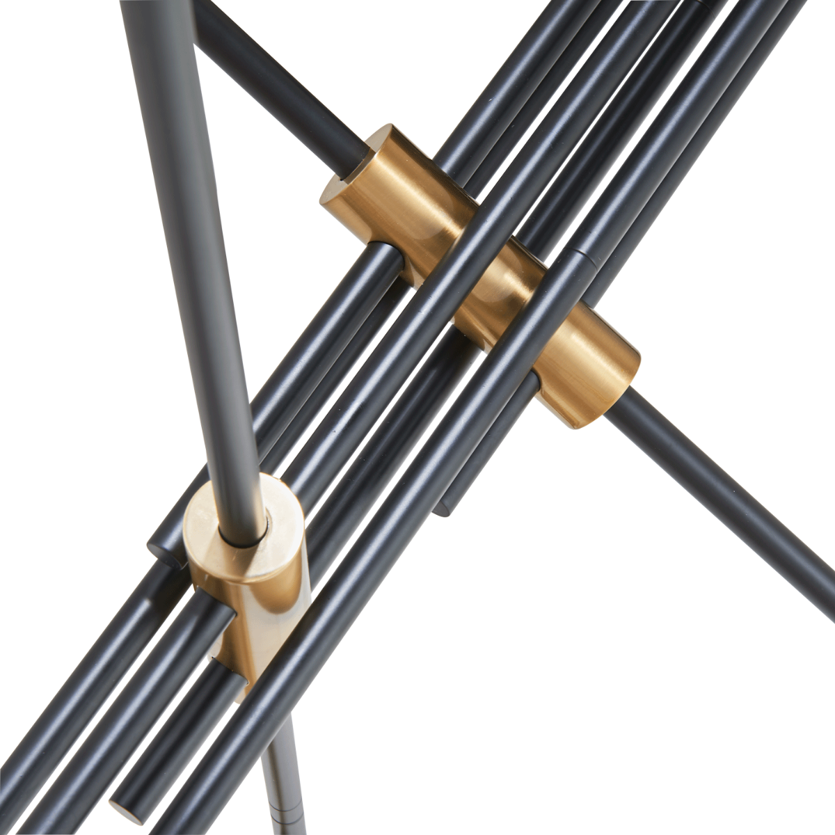 Spartan cylinder pendant light detail showing black arms and gold connectors.