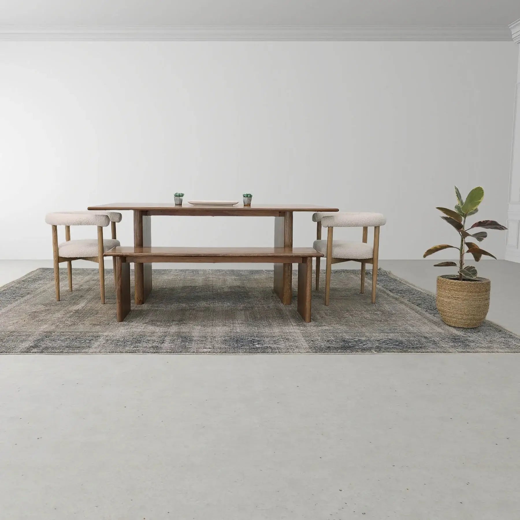 Dallas Brown Wood Dining Table paired with a bench and chairs in a bright dining room setting.