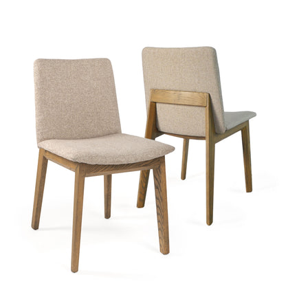 Set of two beige fabric dining chairs with a solid wood frame.