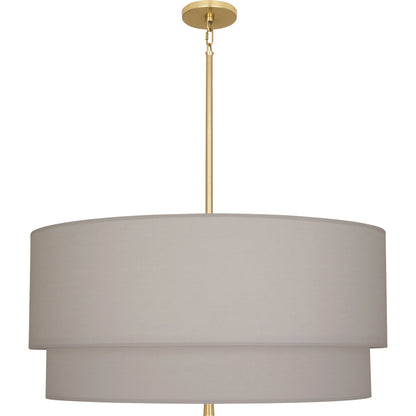 Pendant light with a brass finish and a sleek smoke gray double-layered shade