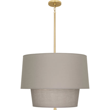 Modern brass pendant light with Smoke Gray fabric shade, offering a bold and contemporary aesthetic.