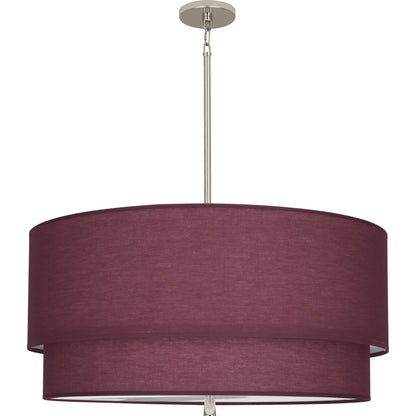 Contemporary pendant light in nickel finish with a vintage winefabric shade.