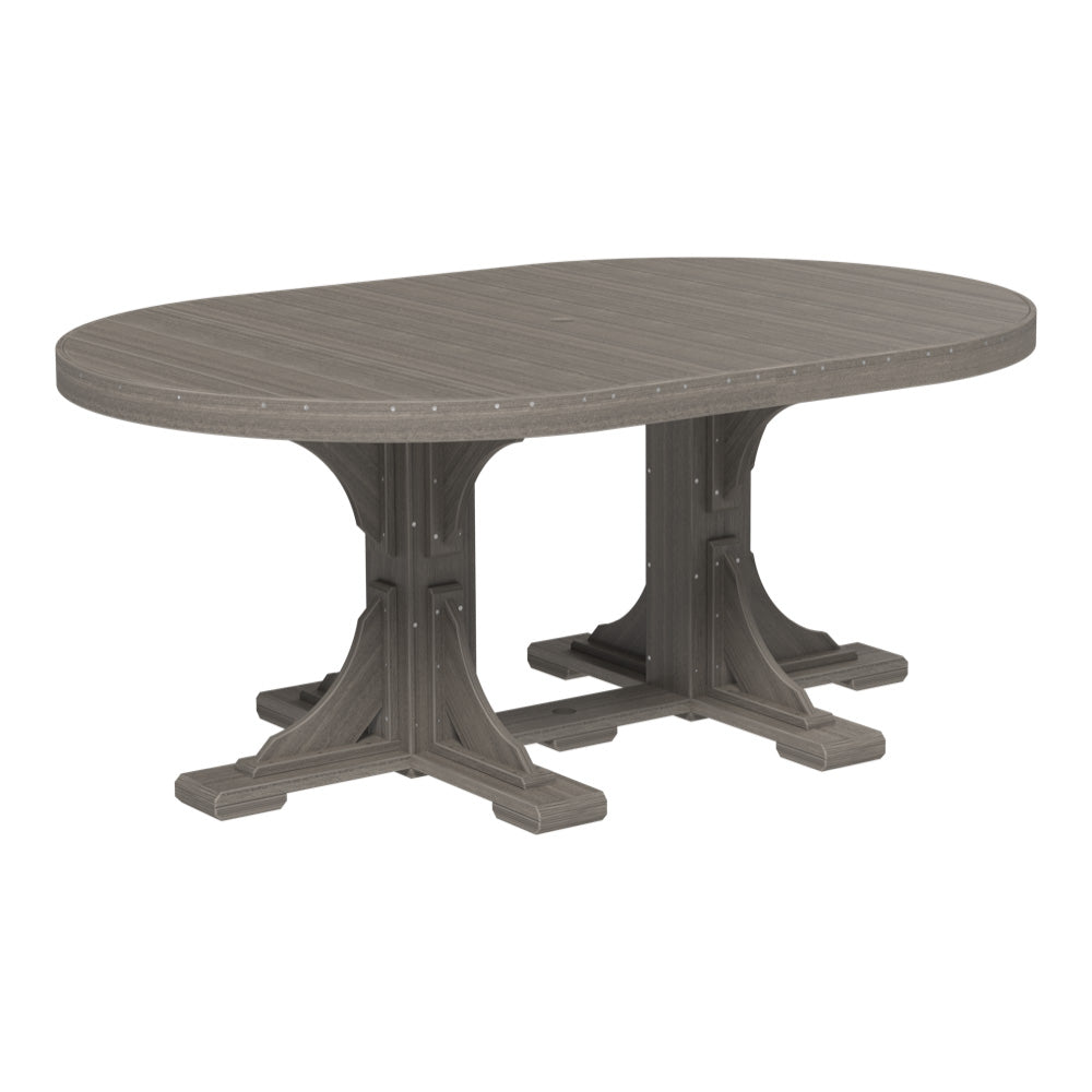 Coastal gray oval dining table for outdoor spaces, included in a 3 piece dining set with bench seating.