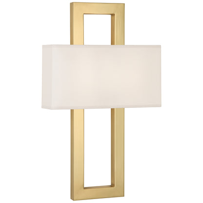 Angled view of the Doughnut Wall Sconce with an antique brass finish and snowflake fabric shade.