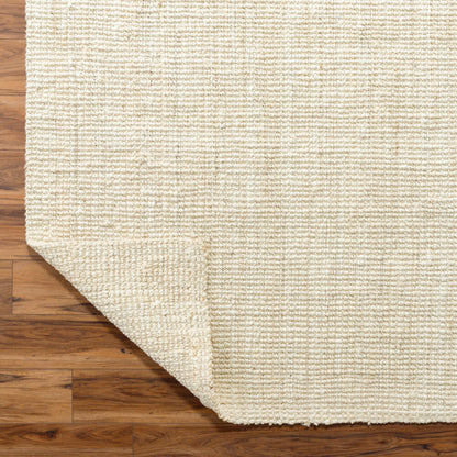 Durable, natural jute rug folded to display flexible construction.