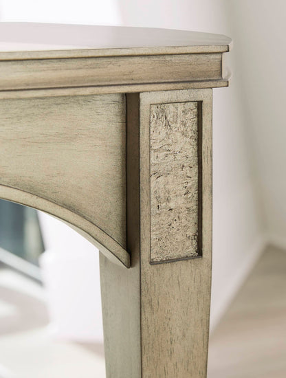 Close-up of the corner detail on a glam rectangular dining table with mica finish