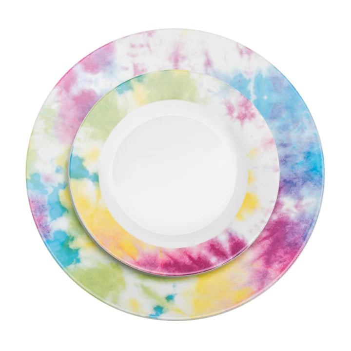 Top view of abstract brushstroke patterned dinner and salad plates.