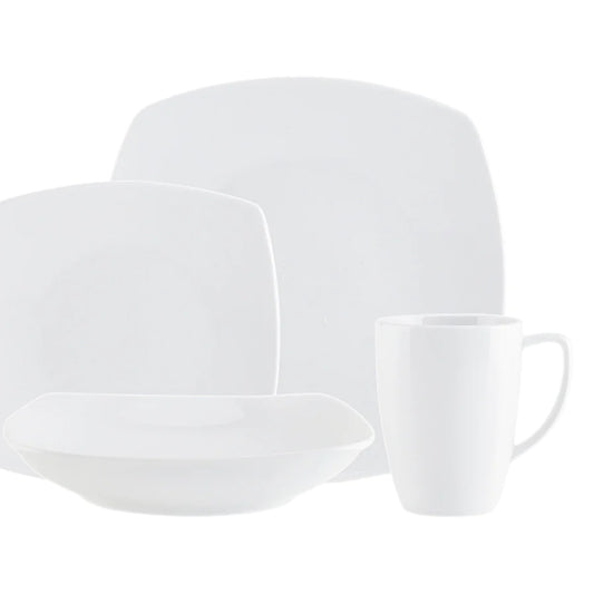 Forward front view of white elgant porcelain dinnerware set for 4 with white background