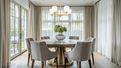 modern gold chandelier in elegant dining room setting.