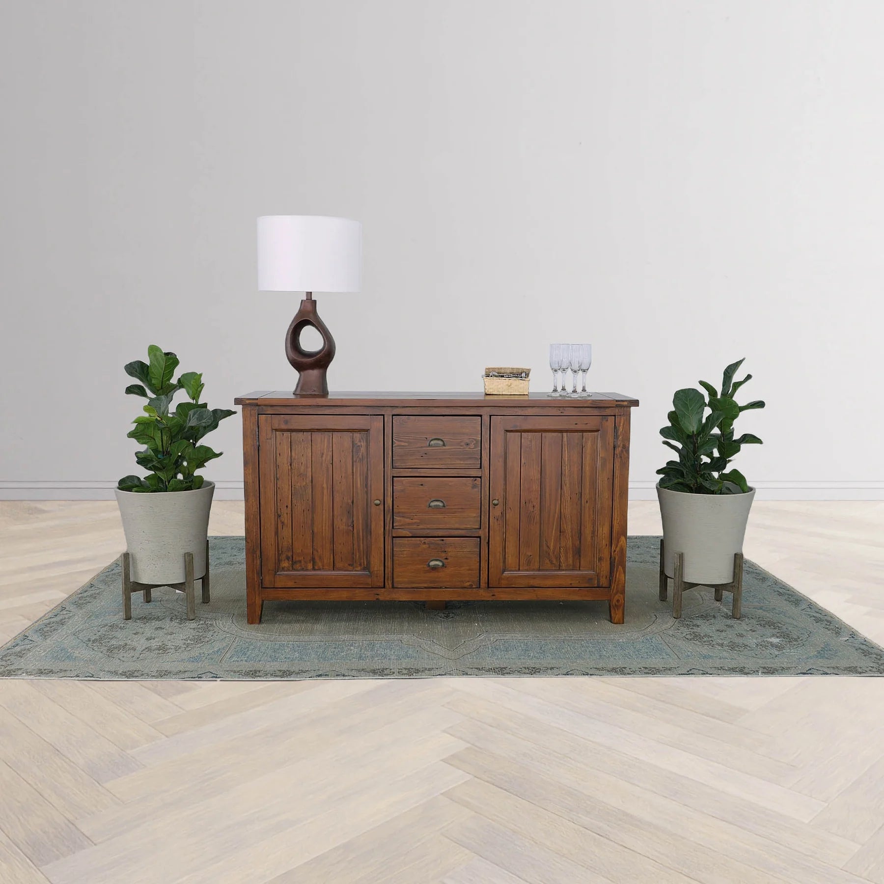 Rustic dining room setup featuring the Irish Coast Large brown dining room sideboard