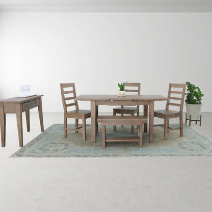 Irish Coast small butterfly leaf dining table set up in a cozy dining room with rustic reclaimed wood decor.