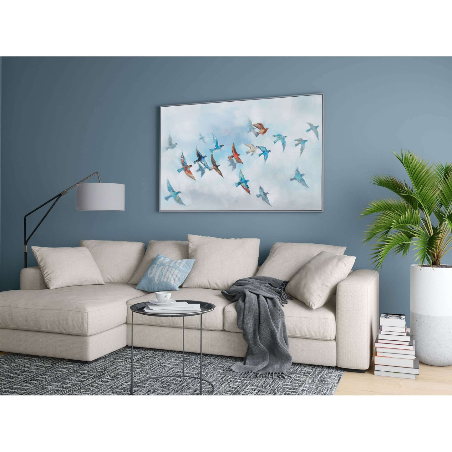 Journey painting styled in a cozy living room with a blue accent wall and cream-colored sofa.