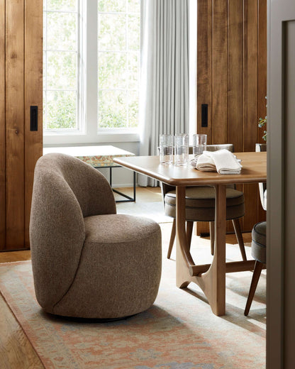 Kamise brown side chair styled in a contemporary dining room setting.