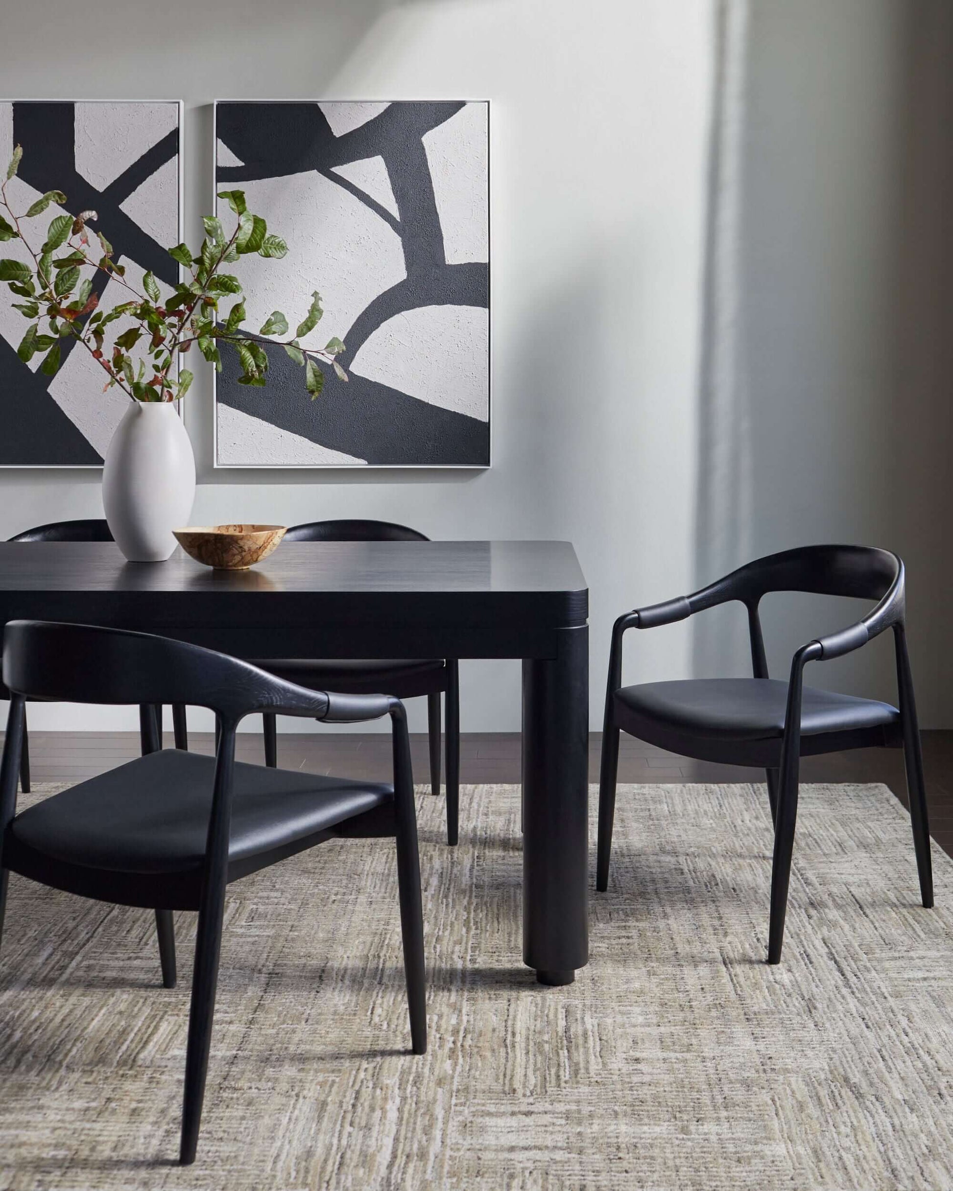 Kisco Dining Arm Chair by Surya in a modern dining room with black dining table