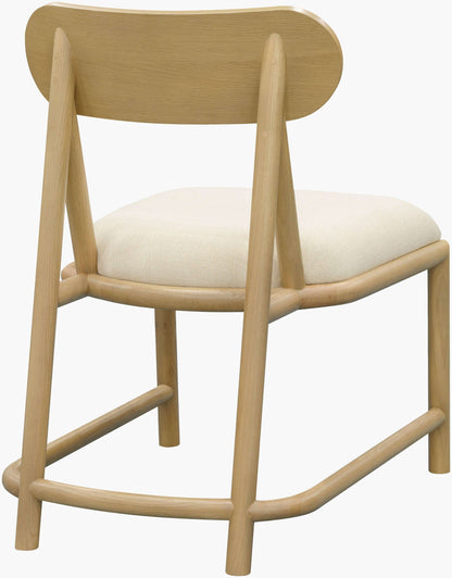 Back view of Keating Dining Chair showcasing its sturdy oak wood construction.