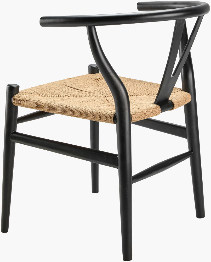 Black modern teak wood dining chair with handwoven seagrass seat, angled back view.