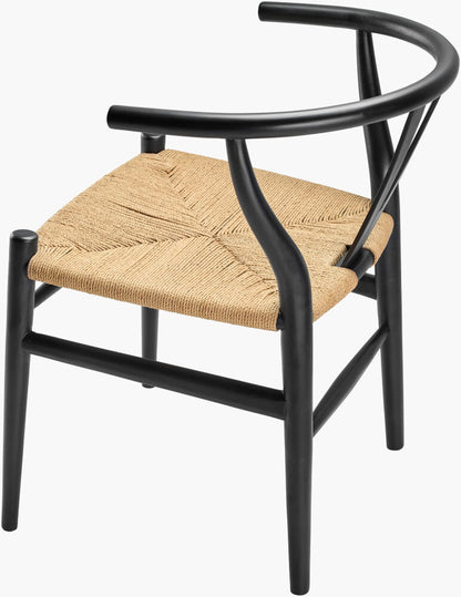 Angled rear view of a black modern teak wood dining chair with a curved backrest and woven seagrass seat.