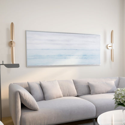 Living room with Blue Horizon painting centered above a white sectional sofa.