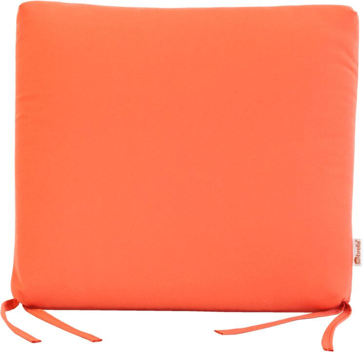 Dining chair seat cushion in melon color with simple, solid design and tie strings for secure fit.