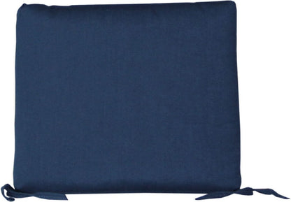 Spectrum indigo outdoor dining chair cushion in a rich, deep navy blue color with a smooth, sleek finish and tie strings.