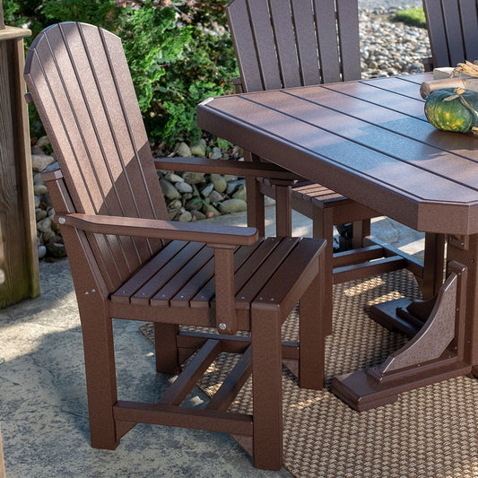 Chestnut Brown Adirondack armchair by a matching dining table on a patio.