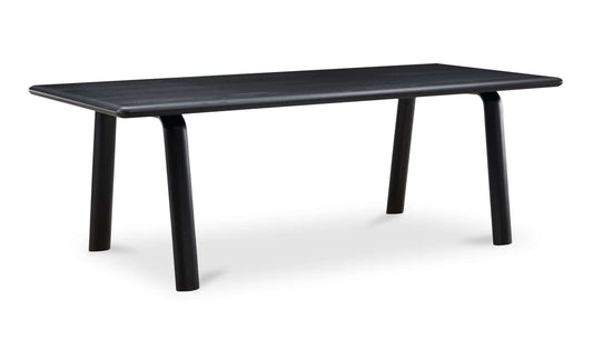 Side view of Malibu Black Dining Table highlighting rounded edges and solid ash construction.