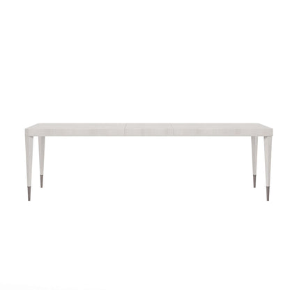 Front view of the Mezzanine Grey Transitional Dining Table with tapered legs and nickel-finished ferrules.