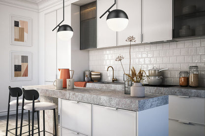 Mid-century modern one-light pendant matte black in modern kitchen.