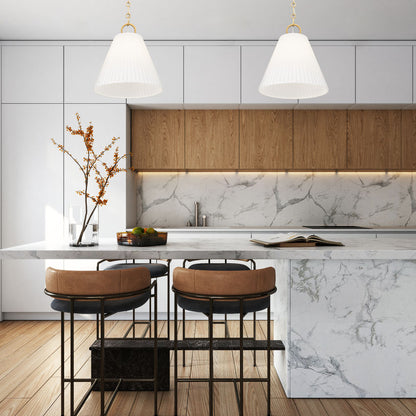 modern gold pendant lights above luxury marble kitchen island.