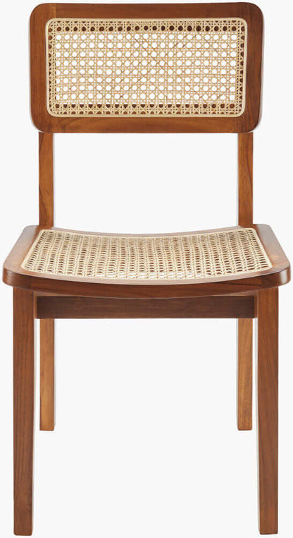 Front view of the Surya Arxan dining chair highlighting its natural rattan backrest and seat.