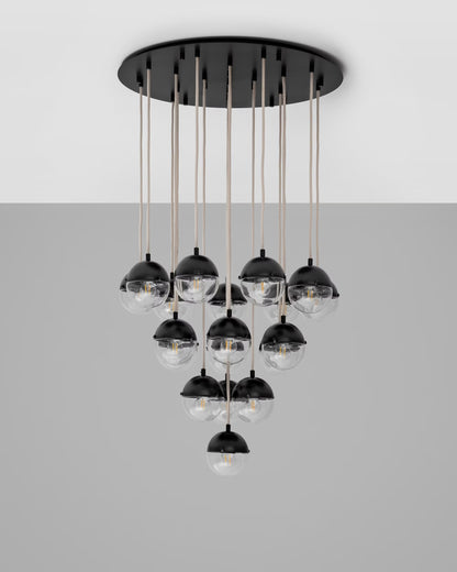 Molecule Cluster 19 Chandelier in black gunmetal finish with clear glass globes and natural rods.