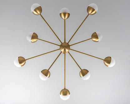 Overhead view of brass Molecule Spark Round 10 Chandelier with frosted glass globes.