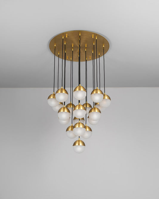 Molecule Cluster 19 Chandelier with frosted glass globes and burnished brass frame, unlit.