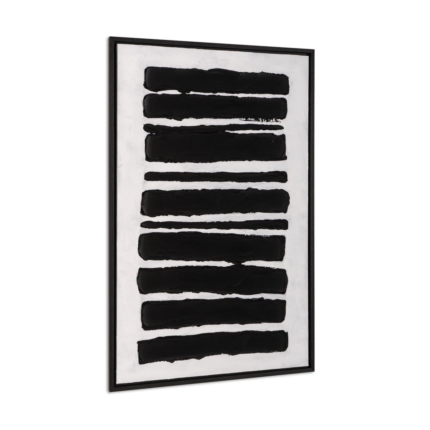 Angled side view of framed black and white abstract canvas art.