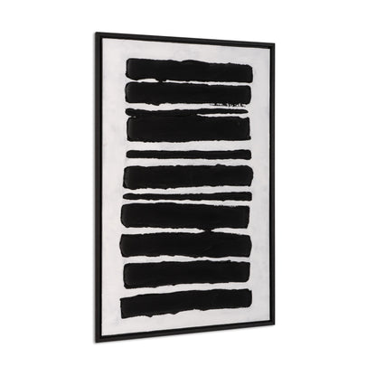 Angled side view of framed black and white abstract canvas art.