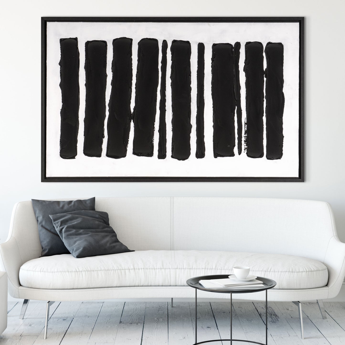 Monochrome abstract wall art showcasing horizontal strokes in a minimalist room.