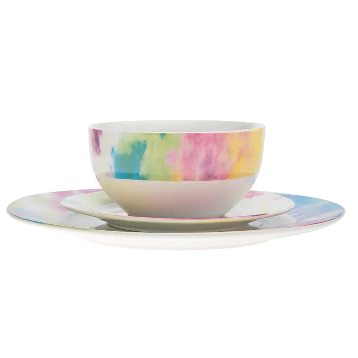 Side view of a multicolor tie-dye porcelain bowl and plate, part of a vibrant 16-piece dinnerware set.