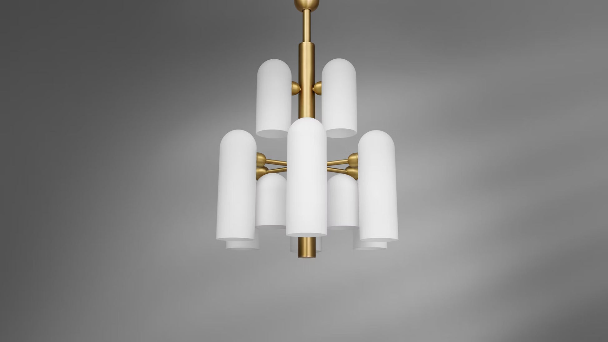 Elegant Odyssey 12 Chandelier with frosted opal glass shades and lacquered burnished brass frame.