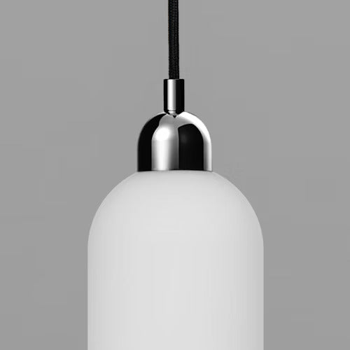 Odyssey Pendant Light in Polished Nickel finish with opal glass shade, turned off.