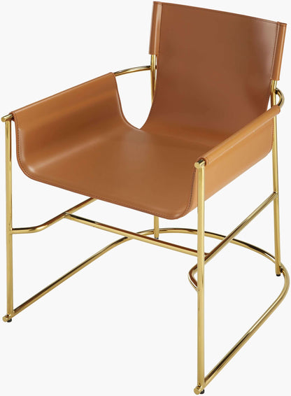 Detail of the armrest and gold frame of the Surya Kara orange modern dining chair.