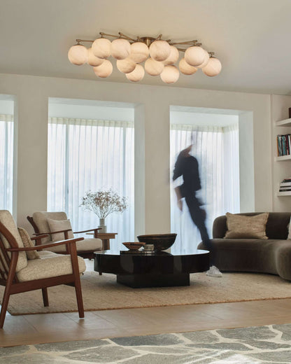 Orion Oval Chandelier in a modern living room.