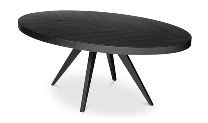 Angled view of the Parq Black Oval Dining Table highlighting the oval top and solid acacia legs.